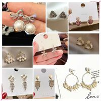 1 Pair Fashion Flower Butterfly Bow Knot Alloy Inlay Artificial Pearls Rhinestones Shell Women's Earrings main image 4