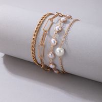 4 Piezas Estilo Simple Ronda Aleación Hebilla Ahuecar Embutido Perla Mujeres Pulsera main image 5