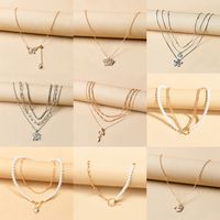 1 Piece Fashion Snake Butterfly Alloy Pearl Inlay Artificial Diamond Women's Pendant Necklace main image 2