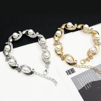 Simple Style Geometric Alloy Inlay Artificial Pearls Rhinestones Women's Bracelets main image 1