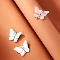Mode Schmetterling Legierung Überzug Inlay Perle Frau Broschen main image 1