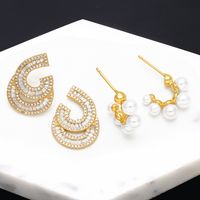 1 Pair Fashion C Shape Plating Inlay Copper Pearl Zircon 18k Gold Plated Ear Studs main image 1
