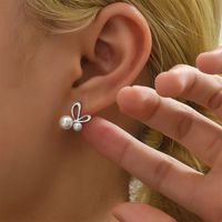 Einfacher Stil Schmetterling Rostfreier Stahl Inlay Künstliche Perlen Ohrringe 1 Paar main image 1