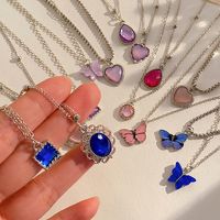 1 Set Fashion Water Droplets Heart Shape Butterfly Alloy Plating Artificial Gemstones Women's Pendant Necklace main image 1