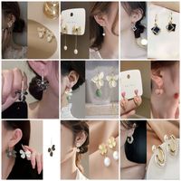 1 Set 1 Pair Simple Style Round Alloy Patchwork Inlay Zircon Women's Drop Earrings Earrings Ear Studs main image 1