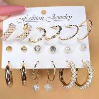 1 Set Simple Style Round Alloy Plating Inlay Rhinestones Pearl Gold Plated Women's Drop Earrings Earrings Ear Studs main image 1