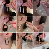 1 Pair Sweet Flower Bow Knot Alloy Plating Inlay Artificial Rhinestones Women's Drop Earrings main image 1