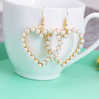 1 Pair Simple Style Heart Shape Alloy Inlay Pearl Women's Earrings main image 1