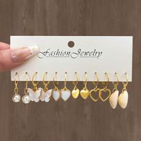 Retro Heart Shape Butterfly Twist Alloy Inlay Artificial Pearls Rhinestones Women's Earrings 1 Set main image 2
