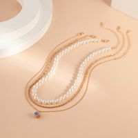 Wholesale Jewelry Casual Round Dice Imitation Pearl Alloy Iron Beaded Chain Layered Necklaces main image 3