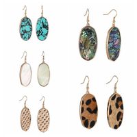 1 Pair Retro Oval Leopard Alloy Straw Inlay Pu Turquoise Shell Women's Drop Earrings main image 1