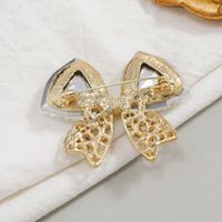 Retro Bow Knot Alloy Plating Artificial Rhinestones Women's Brooches main image 3