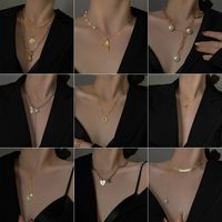1 Piece Fashion Round Heart Shape Fish Tail Alloy Beaded Plating Inlay Pearl Zircon Women's Pendant Necklace main image 1