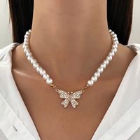Casual Elegant Butterfly Imitation Pearl Alloy Beaded Inlay Rhinestones Women's Pendant Necklace main image 1
