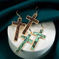 1 Pair Simple Style Cross Leopard Plating Pu Leather Alloy Gold Plated Drop Earrings main image 1