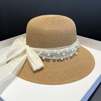 Women's Sweet Solid Color Pearl Bowknot Bucket Hat main image 1