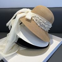Women's Sweet Solid Color Pearl Bowknot Bucket Hat main image 3