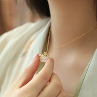 Simple Style Longevity Lock Copper Inlay Artificial Gemstones Gold Plated Pendant Necklace main image 3