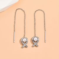 1 Pair Simple Style Fish Inlay 304 Stainless Steel Artificial Pearls Rhinestones Ear Line main image 3