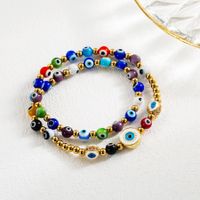 Cool Style Cross Devil's Eye Snake Stainless Steel Artificial Pearl Imitation Pearl Enamel Plating Inlay Artificial Gemstones Gold Plated Bracelets main image 2