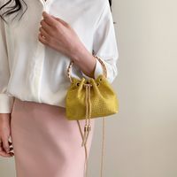 Women's Mini All Seasons Pu Leather Solid Color Streetwear Cylindrical String Handbag main image 5