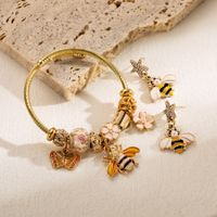 Wholesale Sweet Devil's Eye Heart Shape Bee Stainless Steel Alloy Inlay Artificial Pearls Zircon Bracelets Earrings main image 2