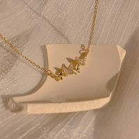 Einfacher Stil Quadrat Blume Bogenknoten Legierung Inlay Künstliche Perlen Strasssteine Frau Halskette sku image 23