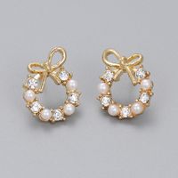1 Pair Simple Style Circle Bow Knot Alloy Hollow Out Inlay Rhinestones Pearl Women's Ear Studs main image 3