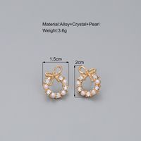 1 Pair Simple Style Circle Bow Knot Alloy Hollow Out Inlay Rhinestones Pearl Women's Ear Studs main image 4