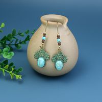 Wholesale Jewelry 1 Pair Bohemian Leaf Round Sun Alloy Turquoise Drop Earrings main image 3