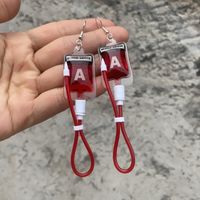 1 Pair Novelty Blood Bag Irregular Stamping Plastic Drop Earrings sku image 4