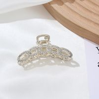 Elegant Star Bow Knot Shell Alloy Plating Hollow Out Inlay Rhinestones Pearl Hair Claws main image 3