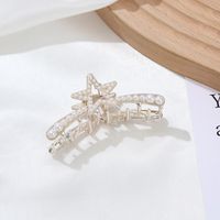Elegant Star Bow Knot Shell Alloy Plating Hollow Out Inlay Rhinestones Pearl Hair Claws main image 6