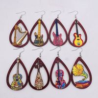 1 Pair Retro Guitar Water Droplets Wood Hollow Out Women's Drop Earrings main image 1