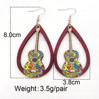 1 Pair Retro Guitar Water Droplets Wood Hollow Out Women's Drop Earrings main image 2