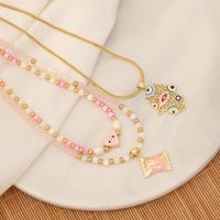 1 Piece Vacation Devil's Eye Hand Heart Shape Imitation Pearl Shell Beaded Women's Pendant Necklace main image 3