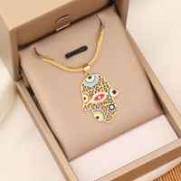 1 Piece Vacation Devil's Eye Hand Heart Shape Imitation Pearl Shell Beaded Women's Pendant Necklace sku image 1