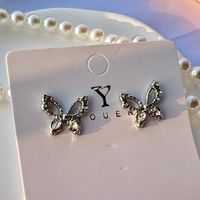 1 Pair Fashion Butterfly Alloy Plating Hollow Out Inlay Rhinestones Silver Plated Women's Ear Studs main image 5