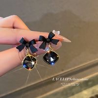 1 Pair Lady Bow Knot Metal Inlay Artificial Gemstones Women's Drop Earrings main image 1
