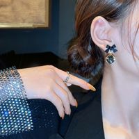 1 Pair Lady Bow Knot Metal Inlay Artificial Gemstones Women's Drop Earrings main image 2