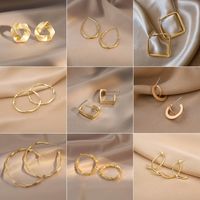 Wholesale Jewelry 1 Pair Simple Style Heart Shape Solid Color Twist Metal Zircon Earrings Ear Studs main image 1