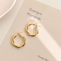 Wholesale Jewelry 1 Pair Simple Style Heart Shape Solid Color Twist Metal Zircon Earrings Ear Studs sku image 1