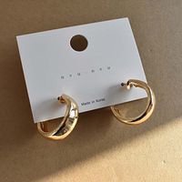 Wholesale Jewelry 1 Pair Simple Style Heart Shape Solid Color Twist Metal Zircon Earrings Ear Studs sku image 2