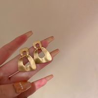 Wholesale Jewelry 1 Pair Simple Style Heart Shape Solid Color Twist Metal Zircon Earrings Ear Studs sku image 20