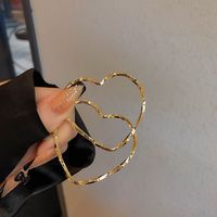 Wholesale Jewelry 1 Pair Simple Style Heart Shape Solid Color Twist Metal Zircon Earrings Ear Studs sku image 14