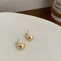 Wholesale Jewelry 1 Pair Simple Style Heart Shape Solid Color Twist Metal Zircon Earrings Ear Studs sku image 17