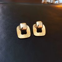 Wholesale Jewelry 1 Pair Simple Style Heart Shape Solid Color Twist Metal Zircon Earrings Ear Studs sku image 34
