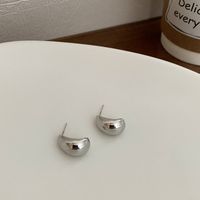 Wholesale Jewelry 1 Pair Simple Style Heart Shape Solid Color Twist Metal Zircon Earrings Ear Studs sku image 18