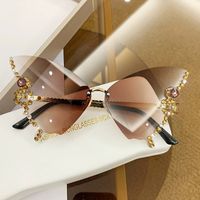 Elegant Einfarbig Ac Schmetterlingsrahmen Diamant Rahmenlos Sonnenbrille Der Frauen sku image 3