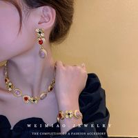 Retro Heart Shape Flower Metal Inlay Artificial Gemstones Women's Bracelets Earrings Necklace main image 4